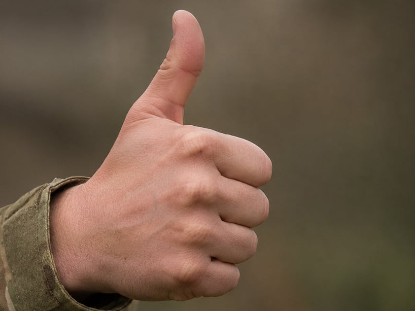What-we-do_TrainingTransformation_training-assurance_thumbs-up-_818x613_new